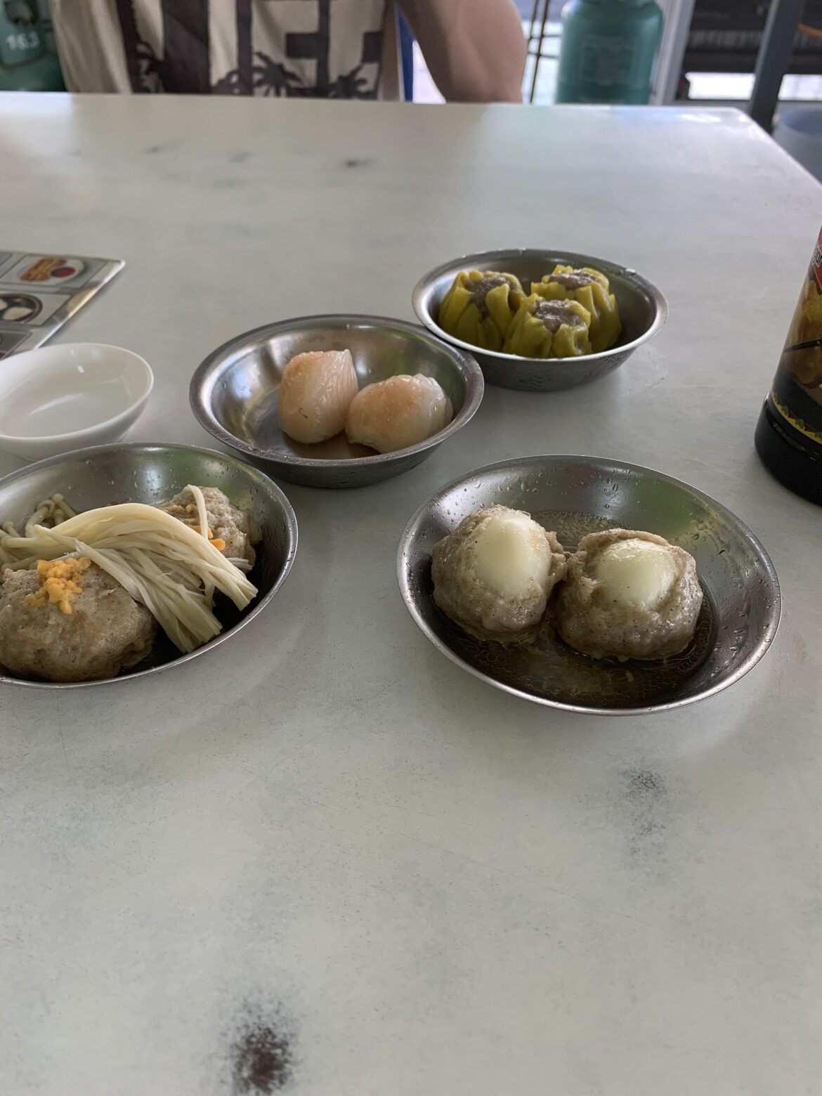 Morning dim sum at a roadside stall in Phuket, Thailand