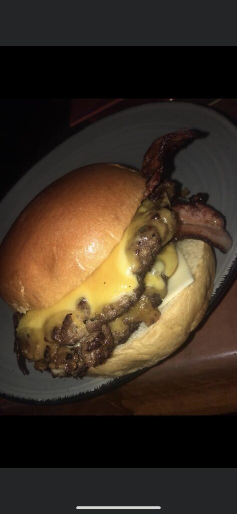 Homemade double smash bacon cheeseburger