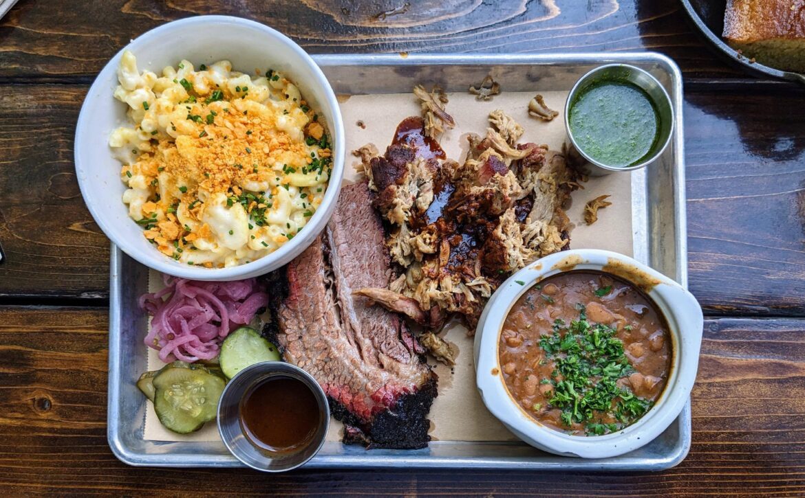 Sliced brisket and chopped pork with a side of mac & cheese and ranch beans (two-meat plate) from MAPLE BLOCK. So filling and satisfying.