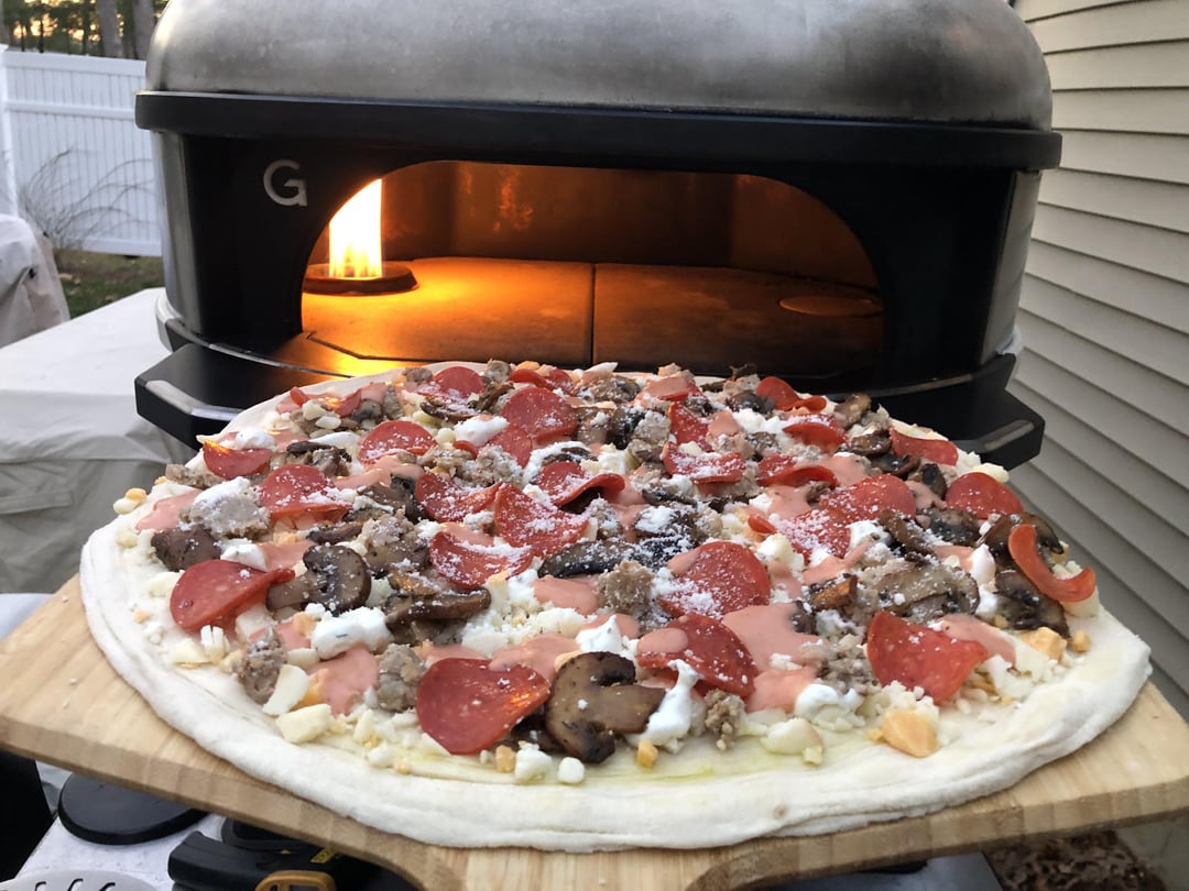 Pizza night! Three cheeses, with a mix of my red sauce and Pecorino cream sauce, sweet Italian