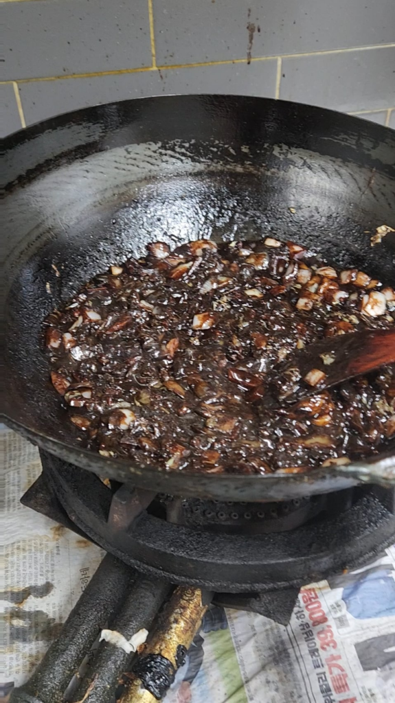 My cousin makes homemade jajangmyeon 짜장면 with this huge wok he has. He uses high quality ingredients so the final product is always superior to what you order