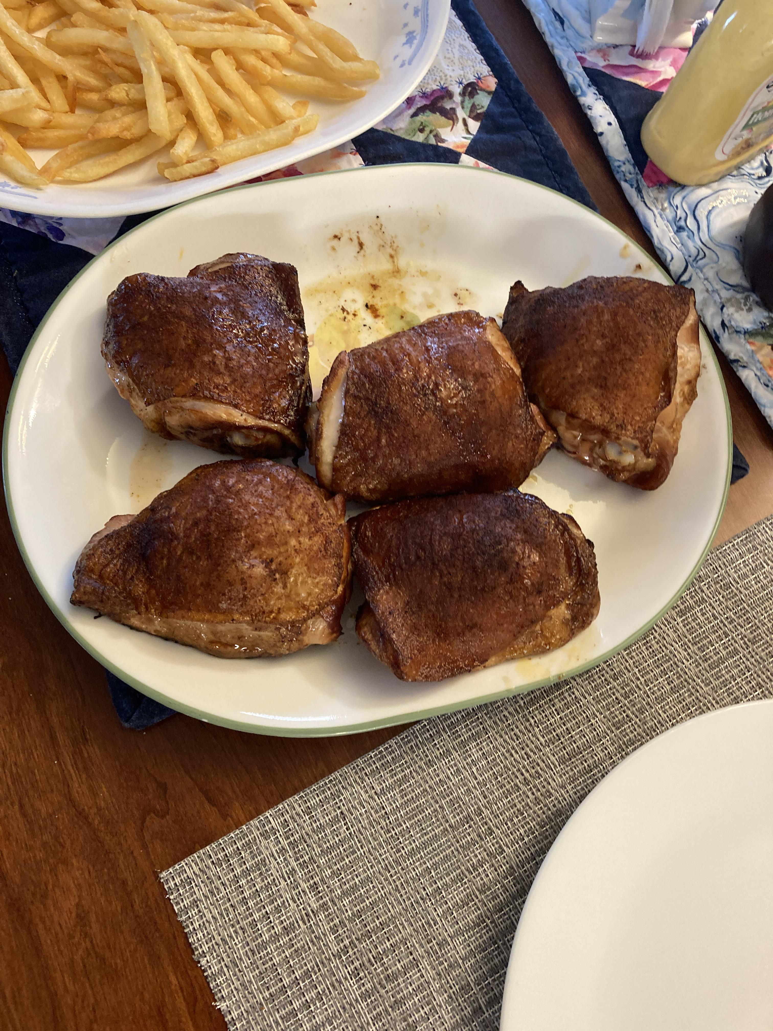 Bone in Chicken Thighs on a charcoal er Performer Grill Dining and