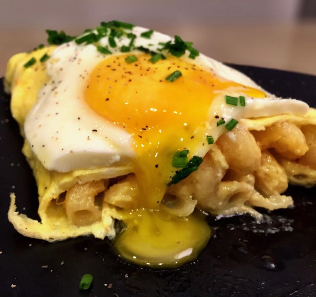 Cross section of my Mac n Cheese omelette. I put an egg on it of course.