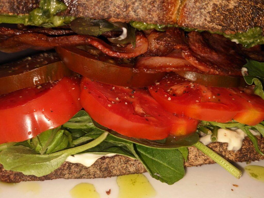 BLT on toasted sourdough with pesto.