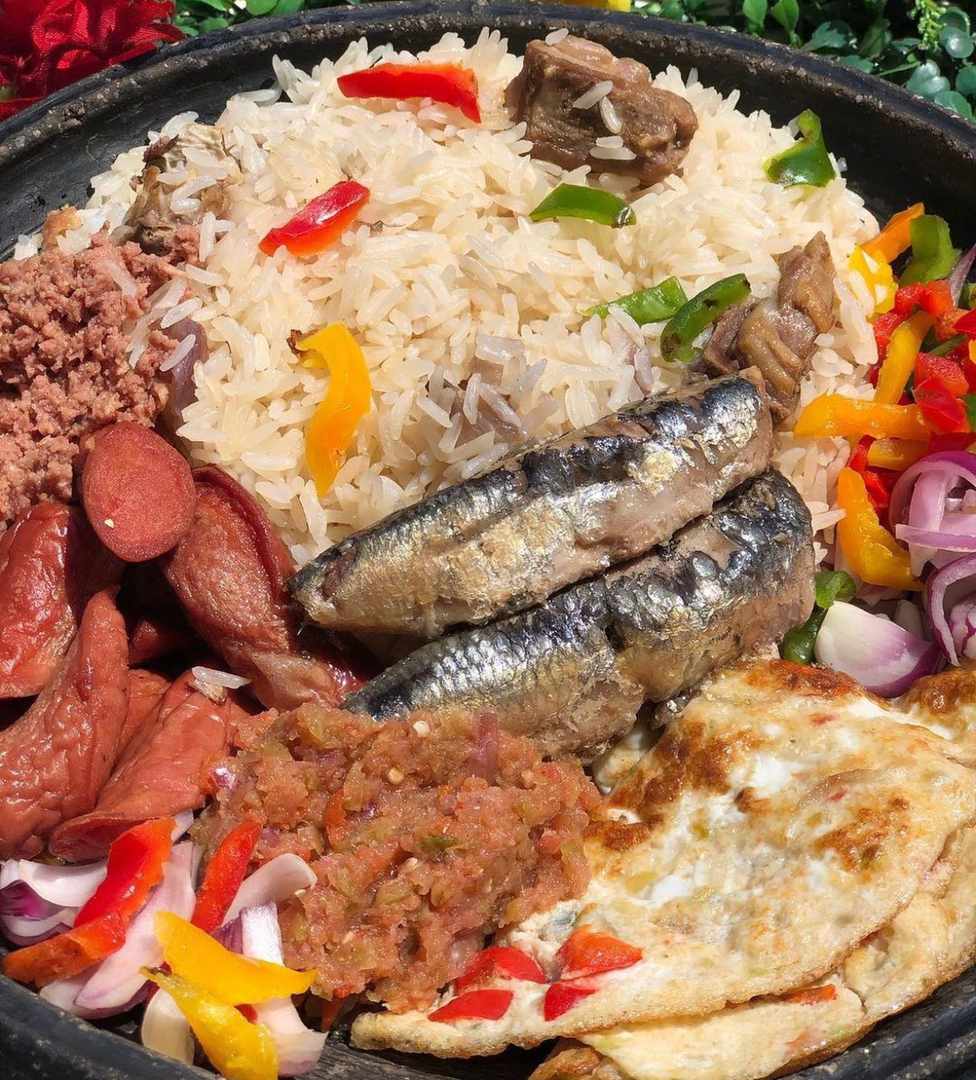 Angwamu (Oil rice, sardines, fried eggs, sliced chicken franks, veggies