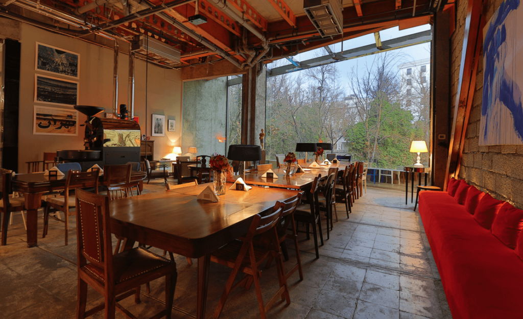 In a culture where people don't interact with strangers at the social table, what would you suggest for interaction between them?