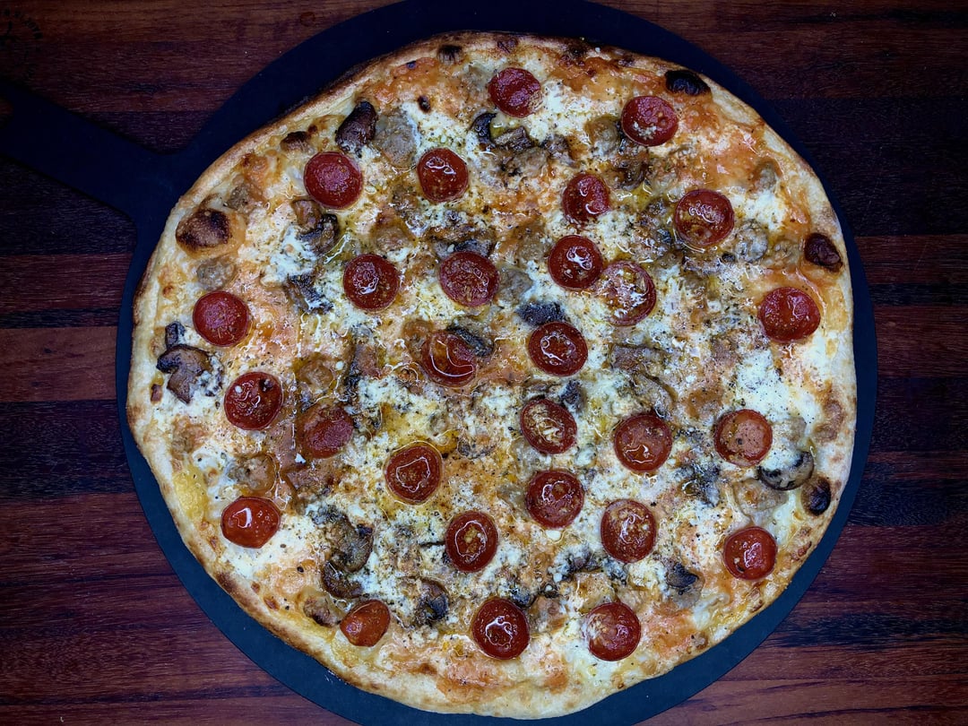 Pizza night! Three cheeses, with a mix of my red sauce and Pecorino cream sauce, sweet Italian