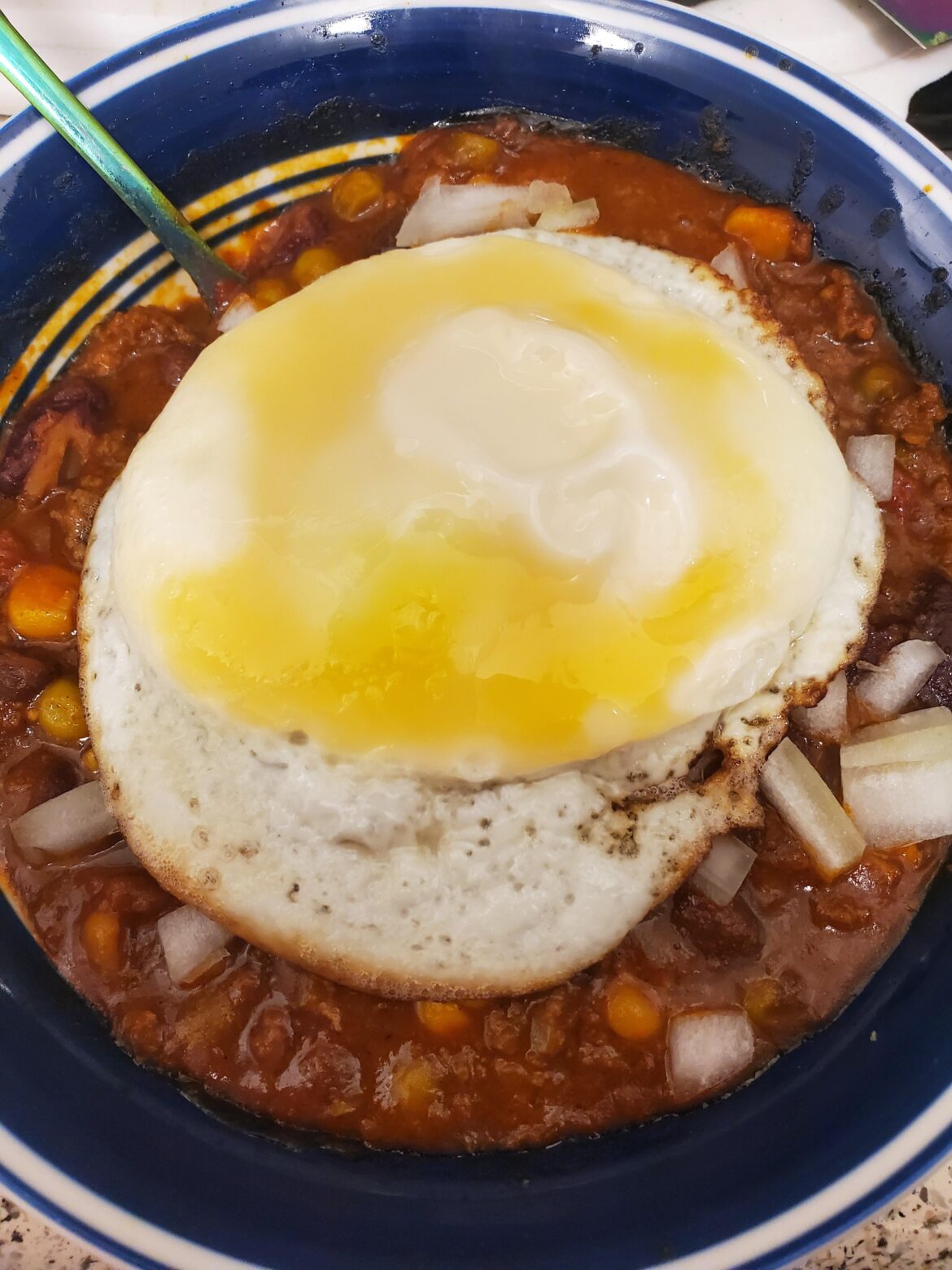 Egg on chili!