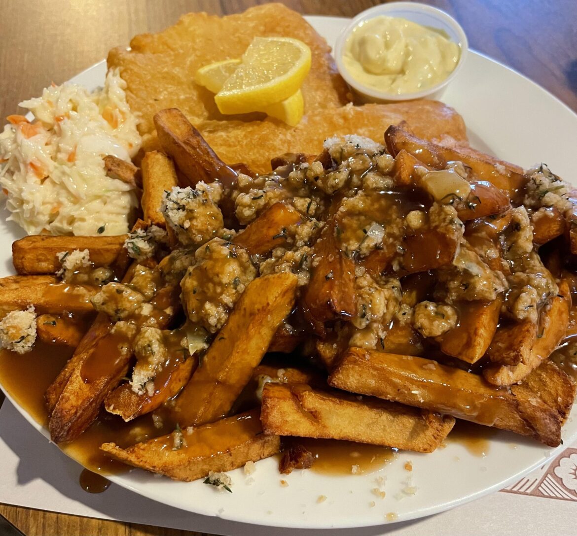 Fish (Atlantic cod) and chips with summer savoury dressing and gravy (Newfoundland and Labrador, Canada)