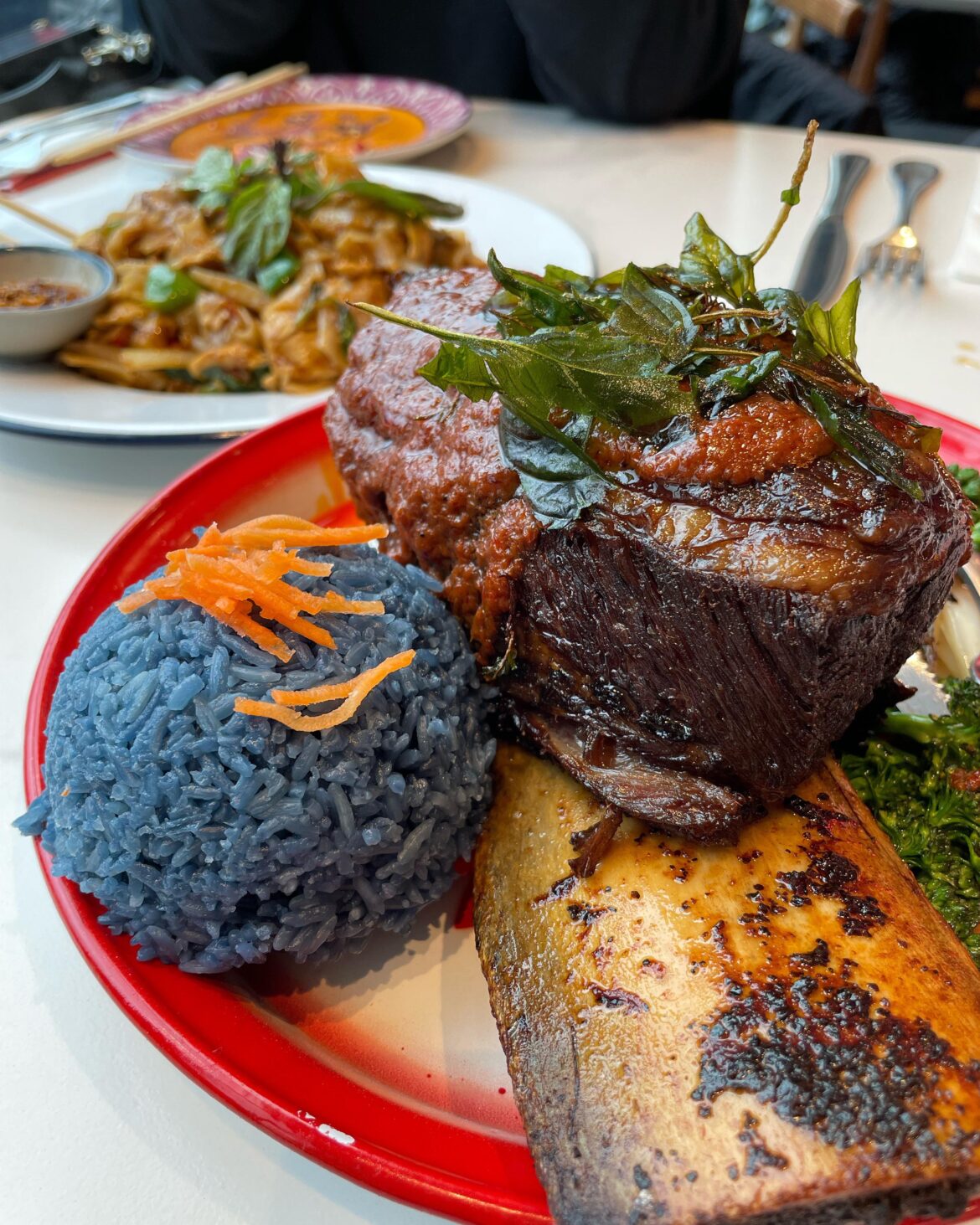 Thai Farmhouse Kitchen is definitely expensive, but this beef rib/blue rice plate was damn good. Super tender and flavorful.