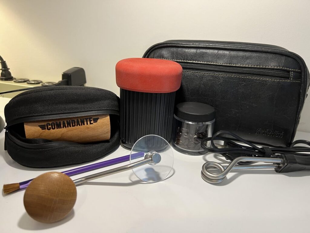 Compact Aeropress Go and Comandante travel coffee Dopp kit.