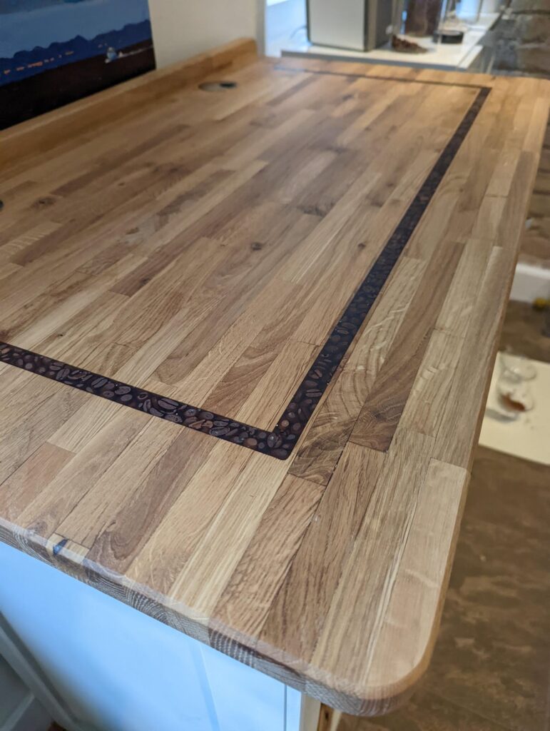 I made this coffee station counter top with some coffee inlaid in it. Dumpster dive wood too!!