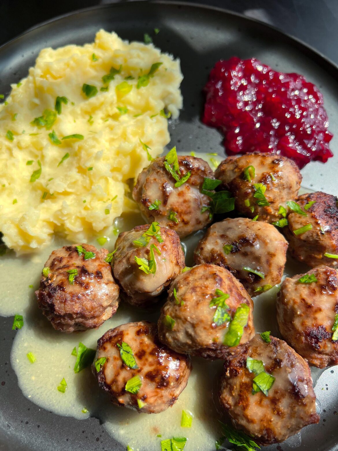 swedish meatball with mashed potatoes and lingonberry jam