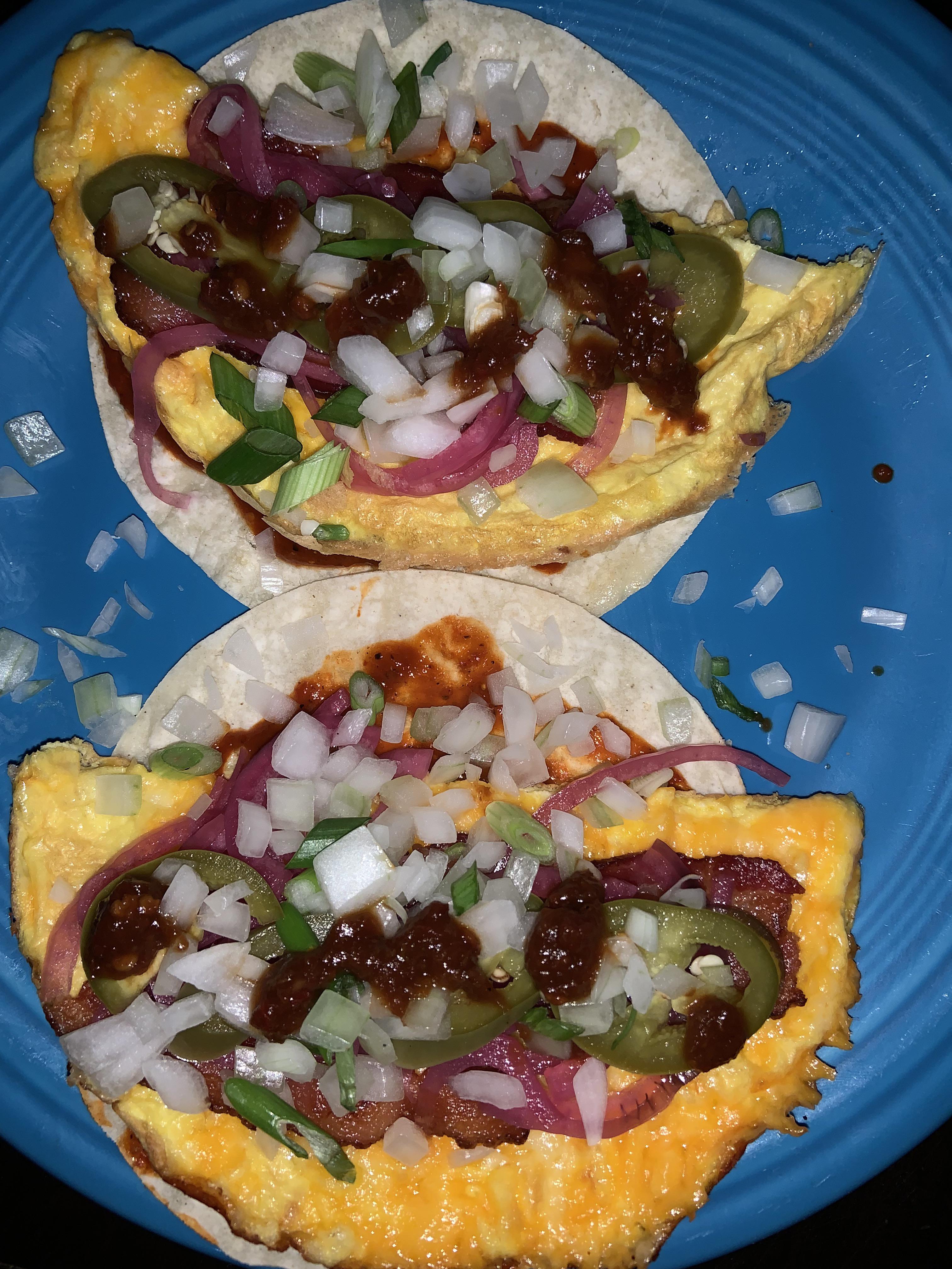 Cheesy egg, bacon, white onion, scallions, homemade cascabel salsa