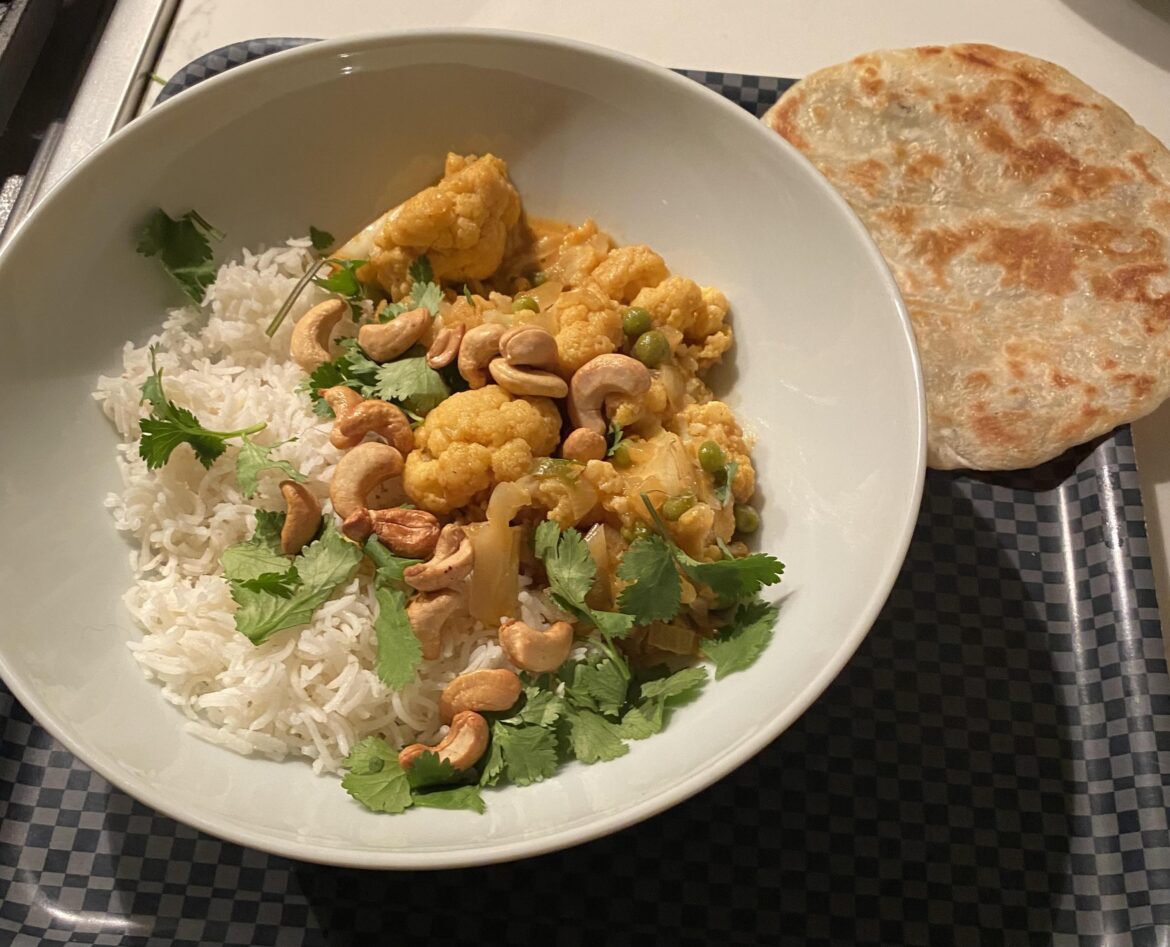 Cauliflower, cashew, pea and coconut curry