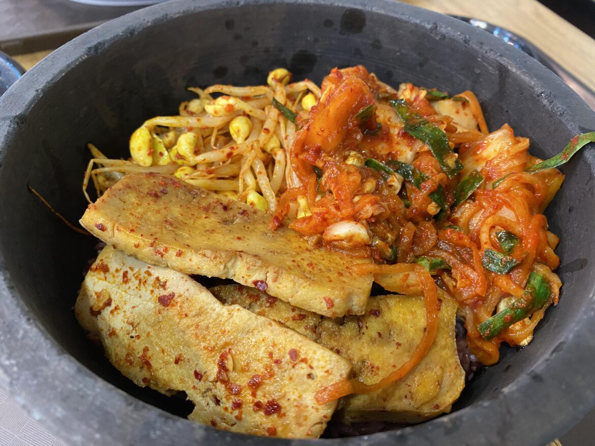 Korean Kimchi served on a Hot stone bowl over rice