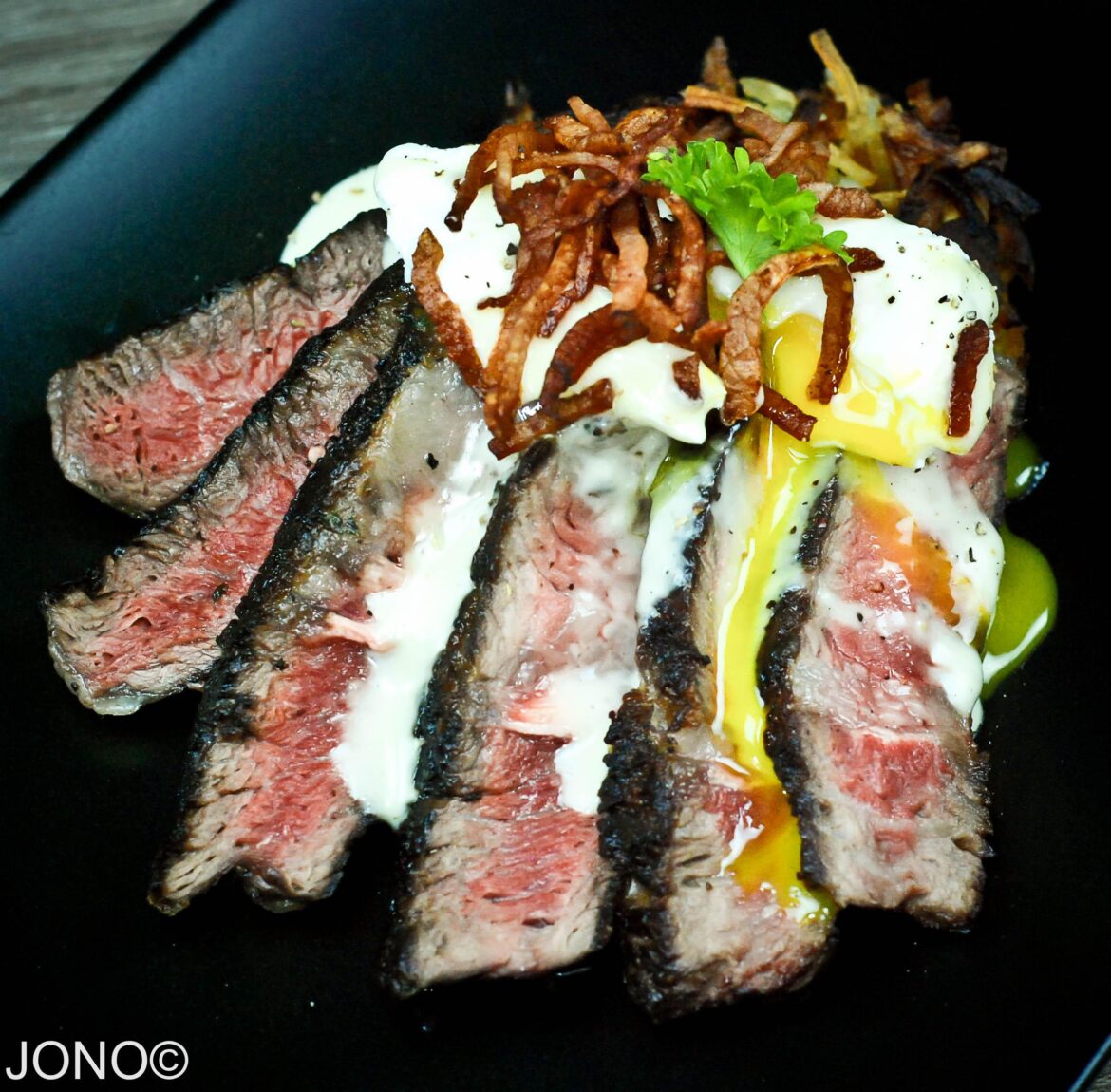 Breakfast: Leftover Ribeye, Rösti, Jalapeno Queso, Crispy Canadian Bacon & Egg