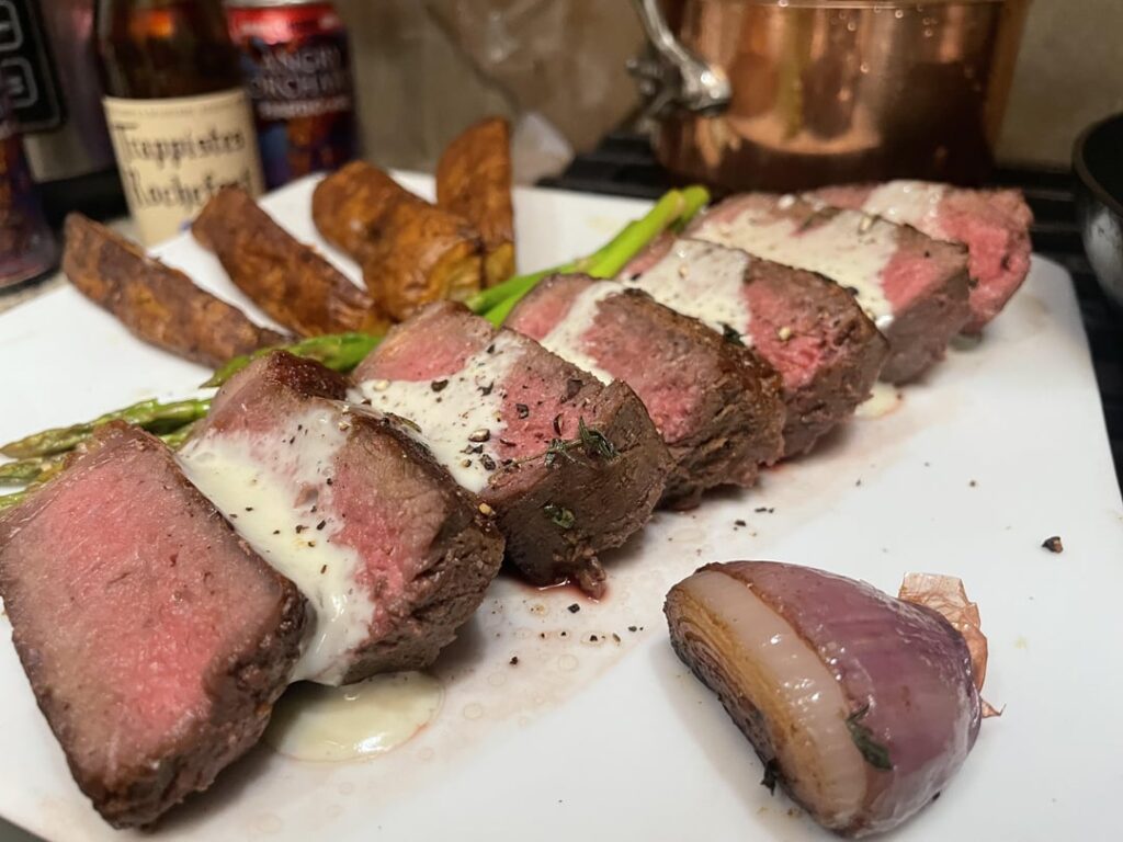 12oz sirloin, Dansk blue cheese sauce, potato spears and asparagus