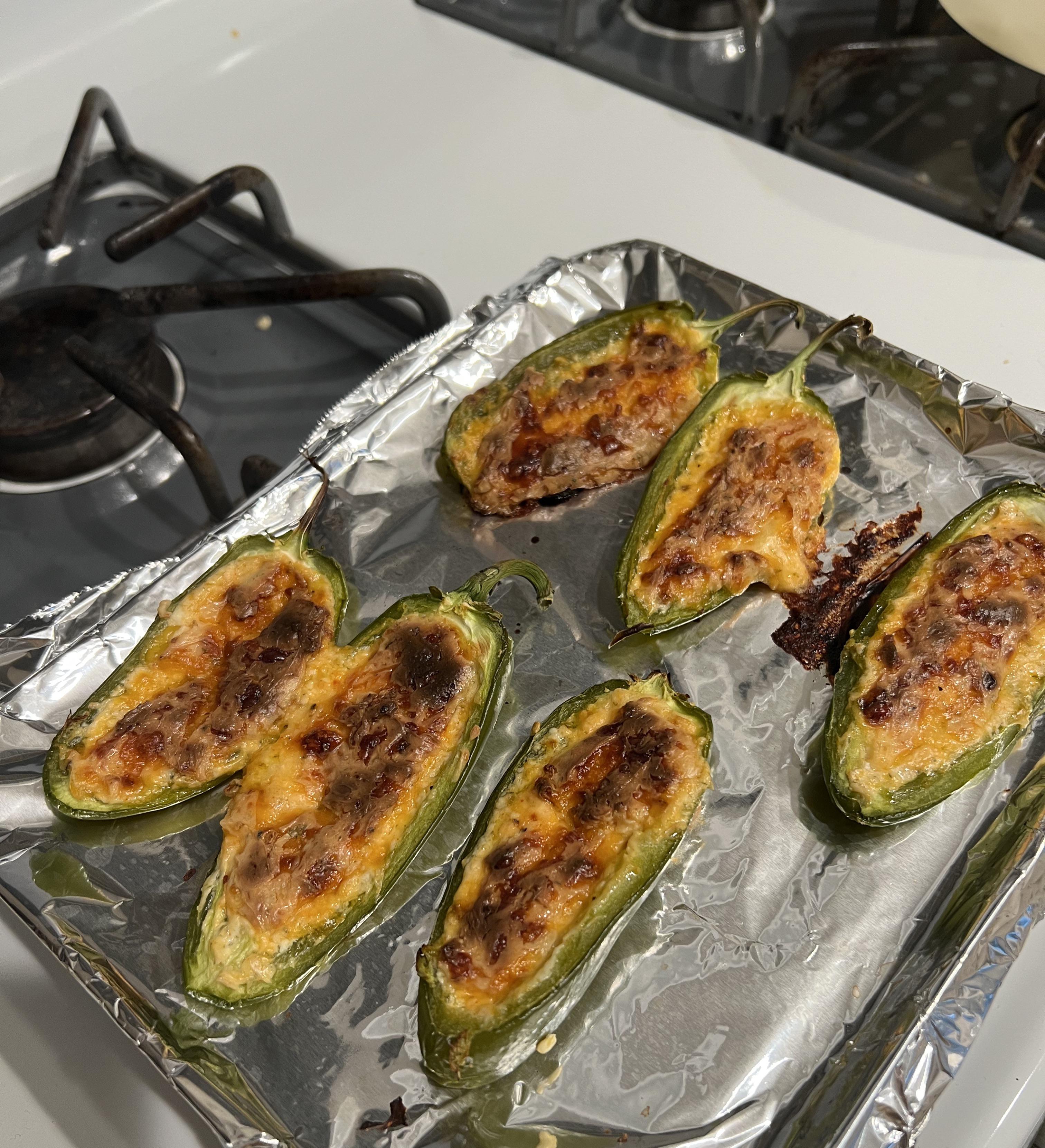 cheddar and cream cheesestuffed jalapeños. 350 calories Dining and