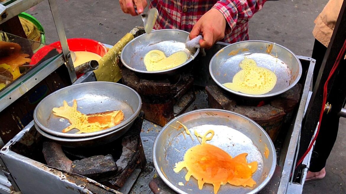 This Lady Hand Draws Animals Shaped Crepes In Vietnam