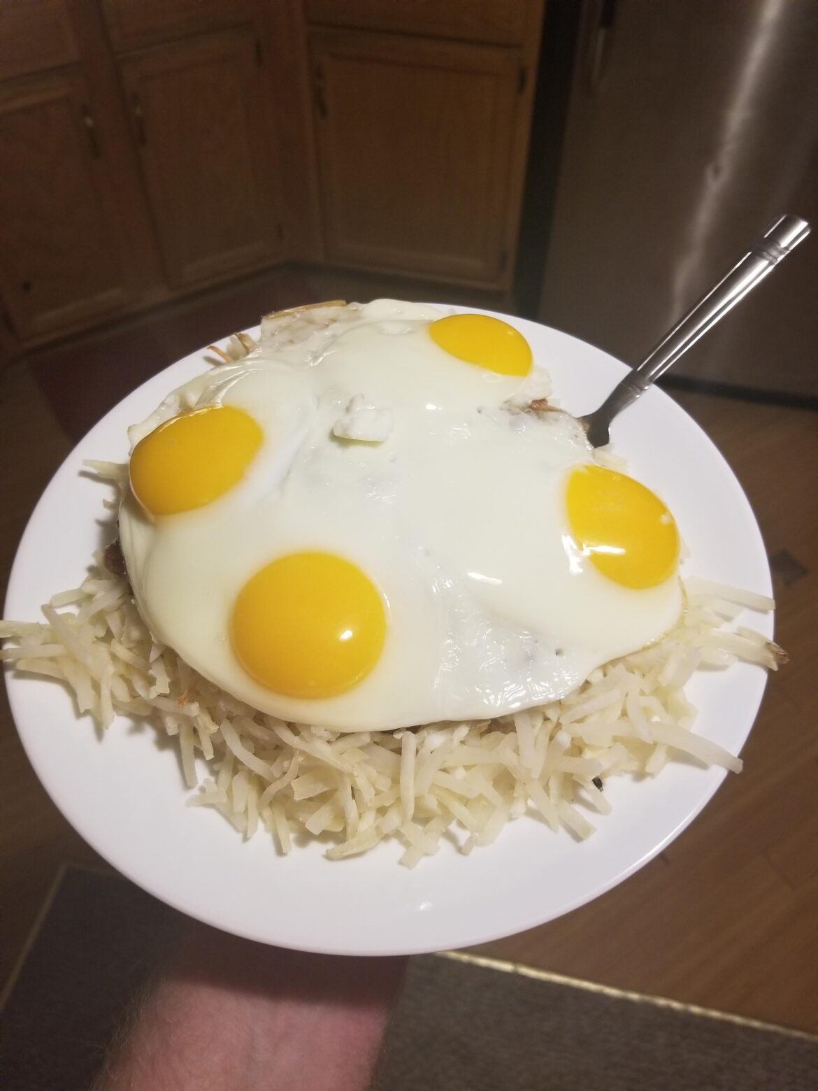 4 eggs over Carolina reaper chili and hashbrowns