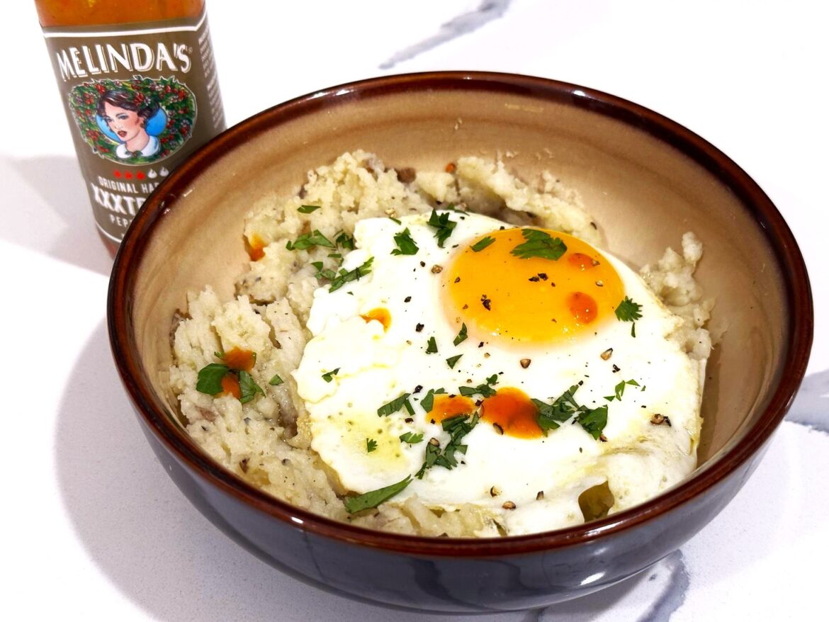 leftover mashed potatoes and a butter fried egg.