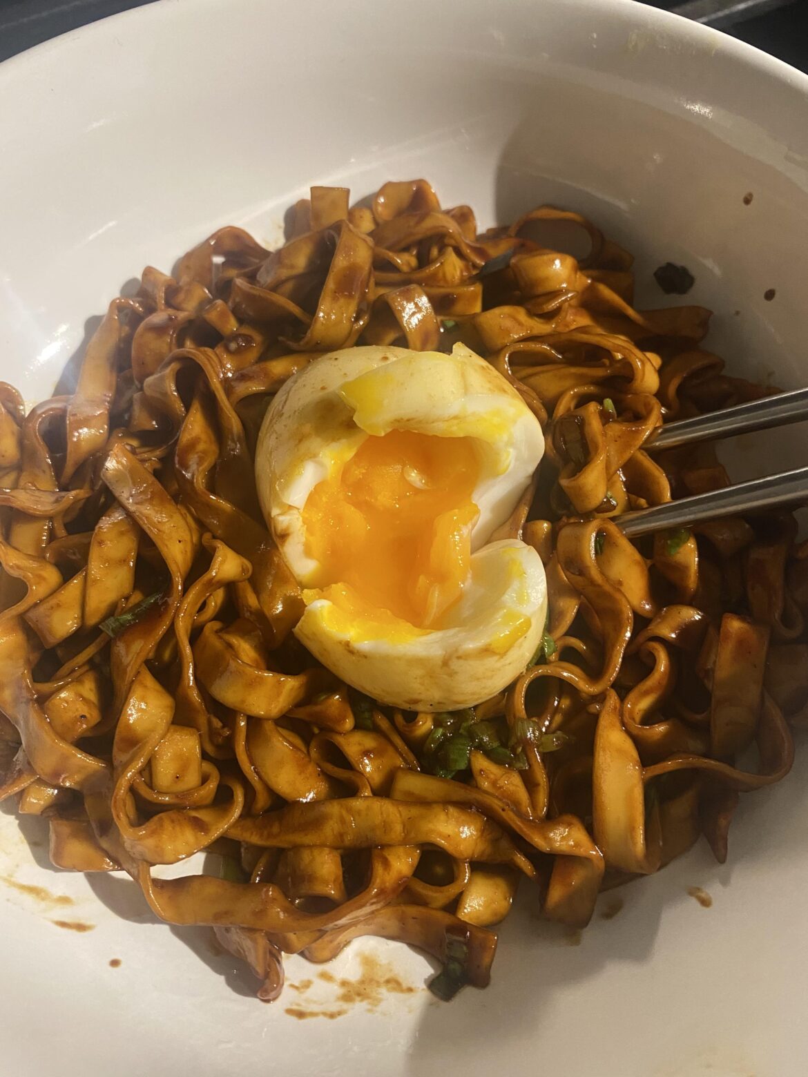 Soft boiled on some tingly chili momofuku noodles.