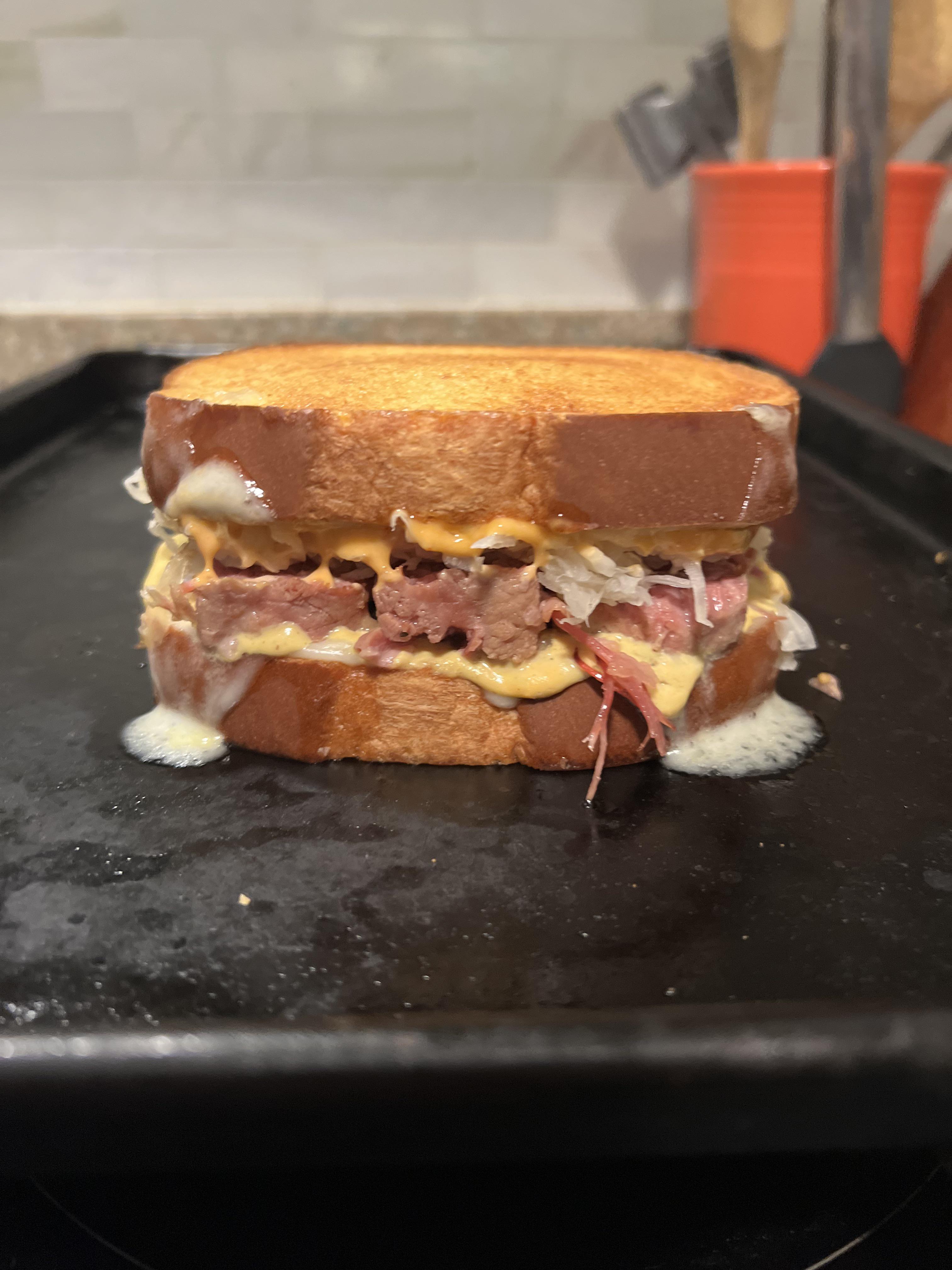 Corned beef, kraut, Swiss, pickles, 1000 Island dressing, Dijon mustard