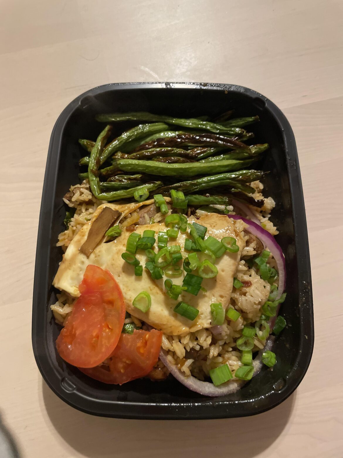 “Breakfast” fried rice made with leftover steak tips, random vege bits, one scrambled egg, and one once over easy :) lazy meal but less waste!