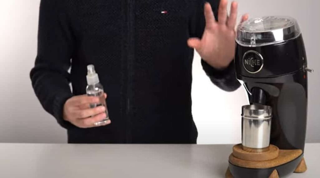 Why Spray Coffee Beans Before Grinding?