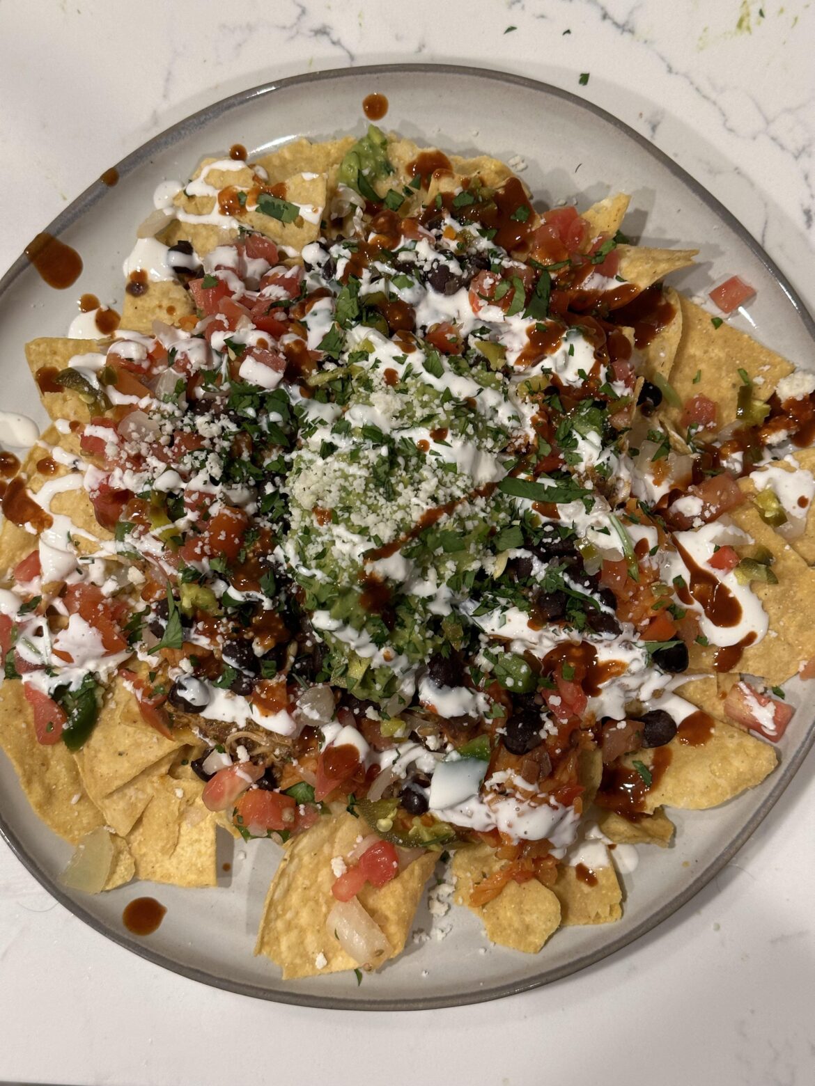 kenji’s tinga on nachos