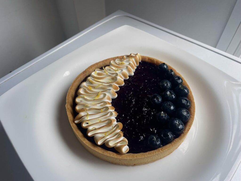 blueberry, lemon and almond tart topped with swiss meringue :)