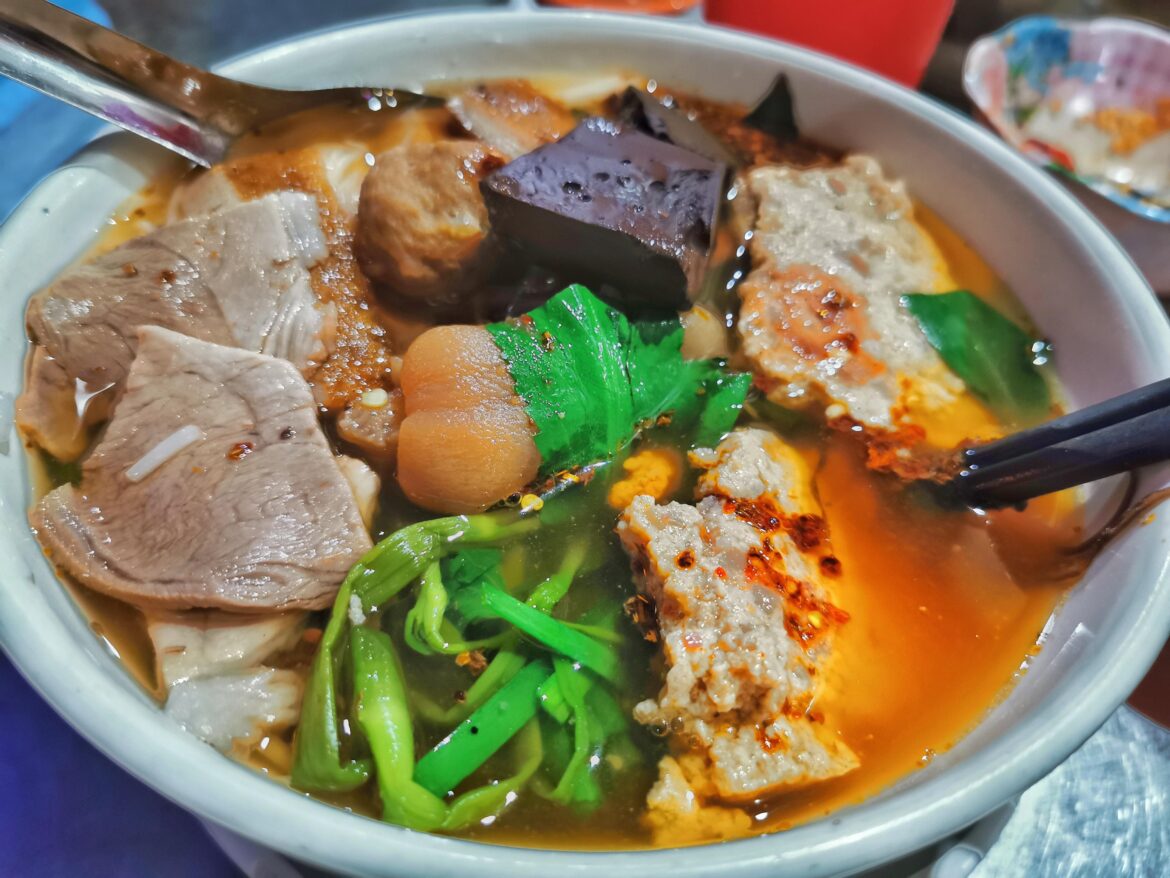 Vietnamese noodles, crab paste and pork knuckle