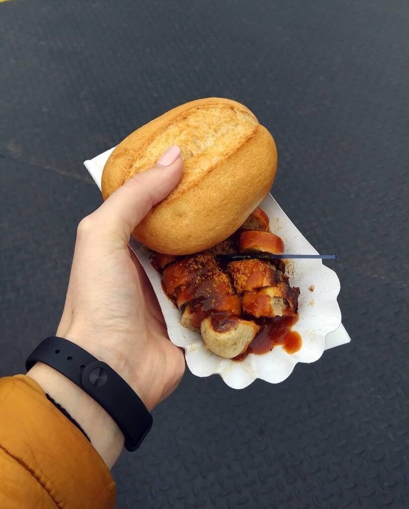 Bratwurst with tomato mustard sauce and bread - simple yet delisious. Was eaten on a ferry crossing near Königswinter, Germany