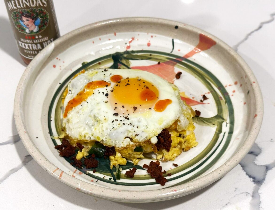 scrambled eggs w/jalapeno, onion, cheddar, chorizo...and a fried egg