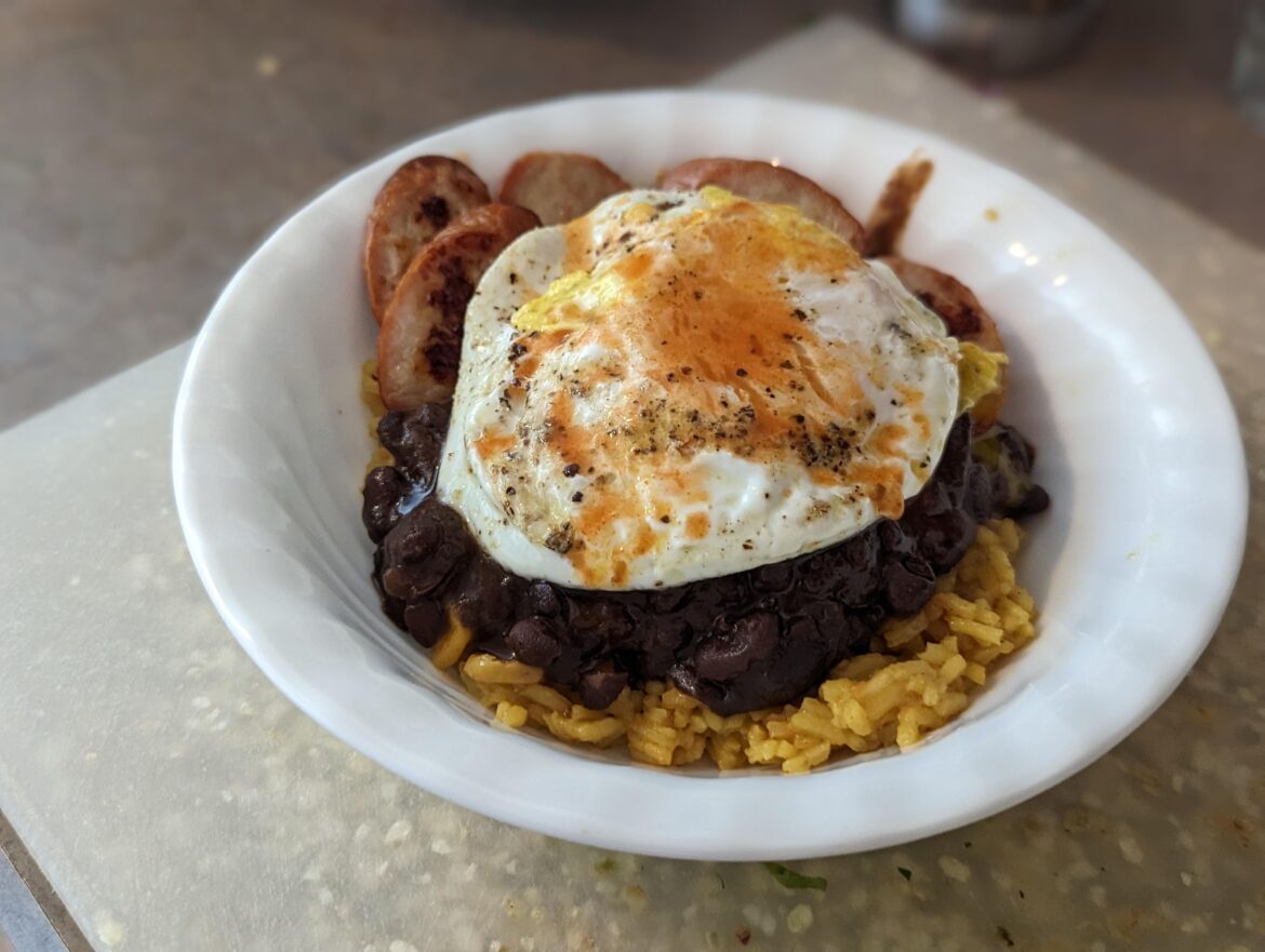 rice, black beans, chicken sausage, egg, & tabasco