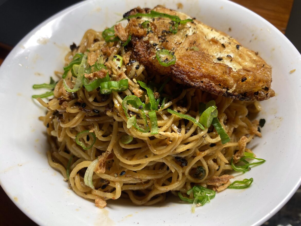 Fried egg on scallion oil noodles