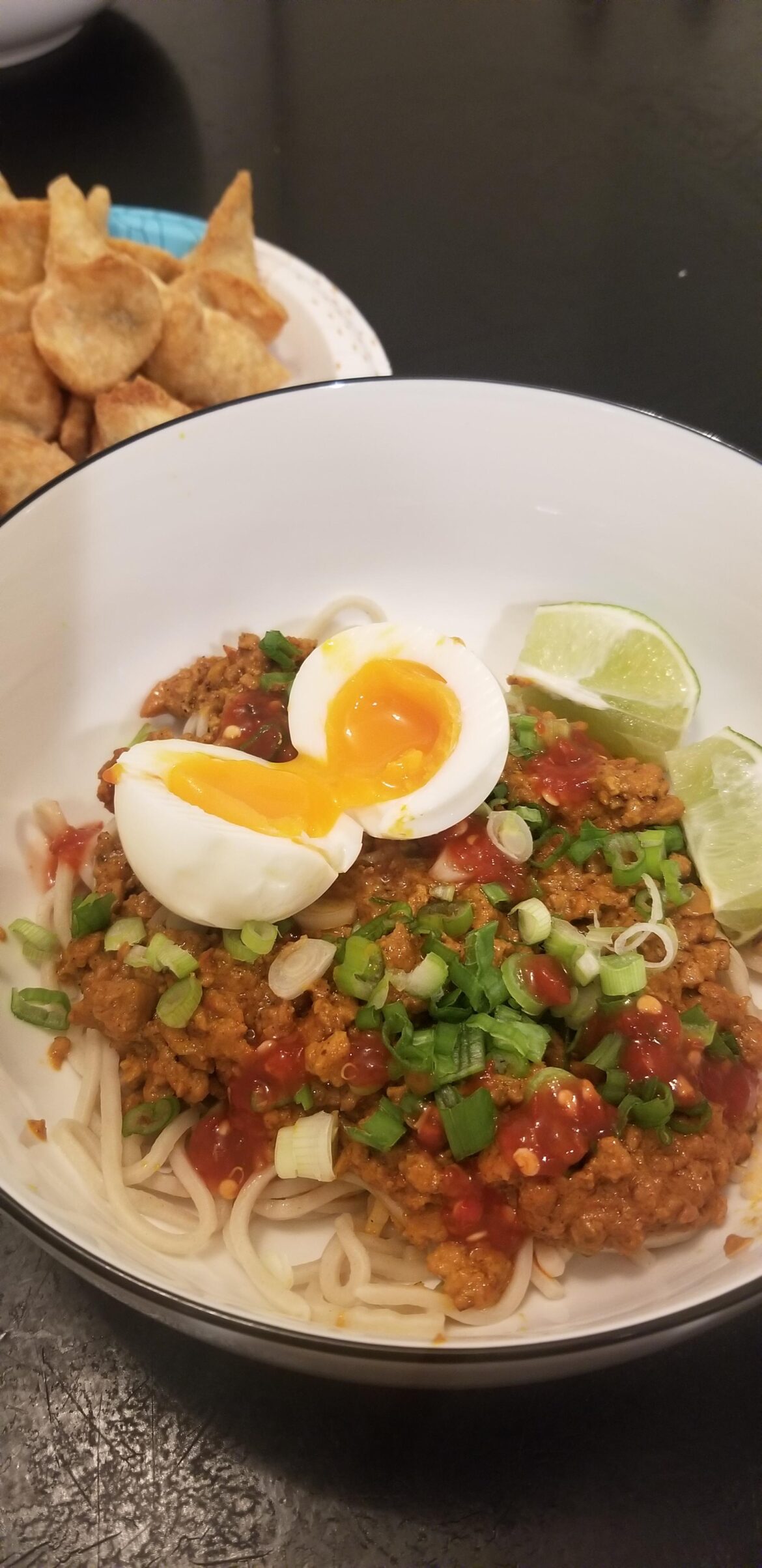 Dan Dan Noodles with egg on it