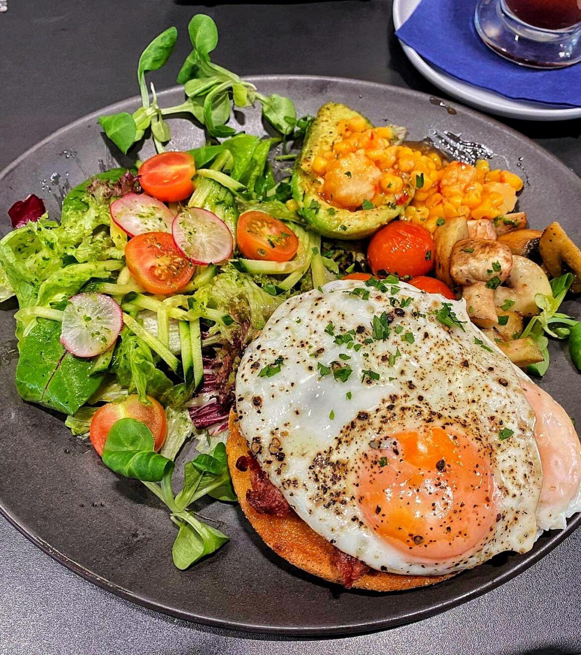 Runny one on a waffle and bacon