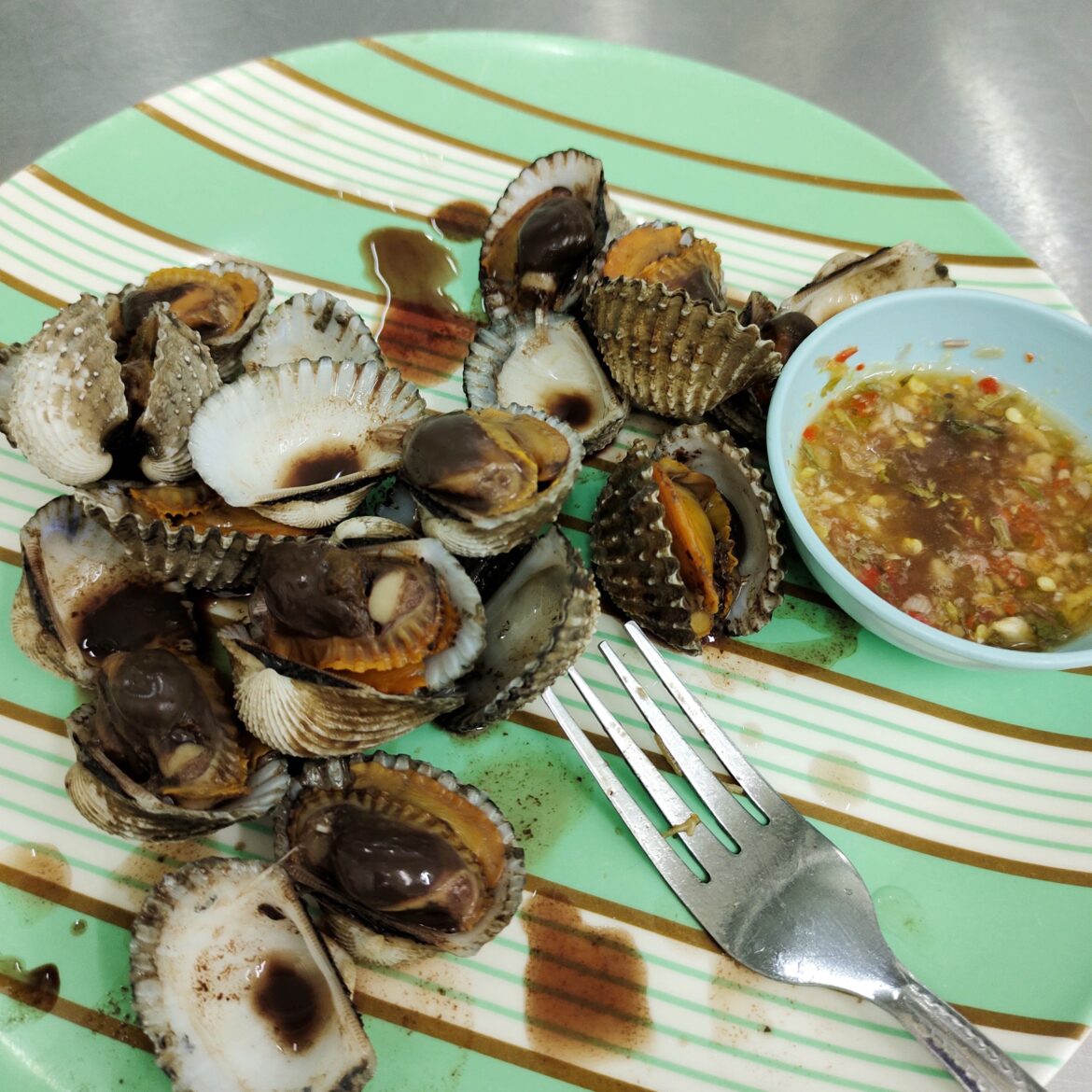 Boiled cockle with seafood sauce in bangkok