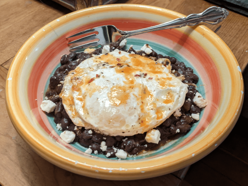 black beans, feta, egg, and tabasco