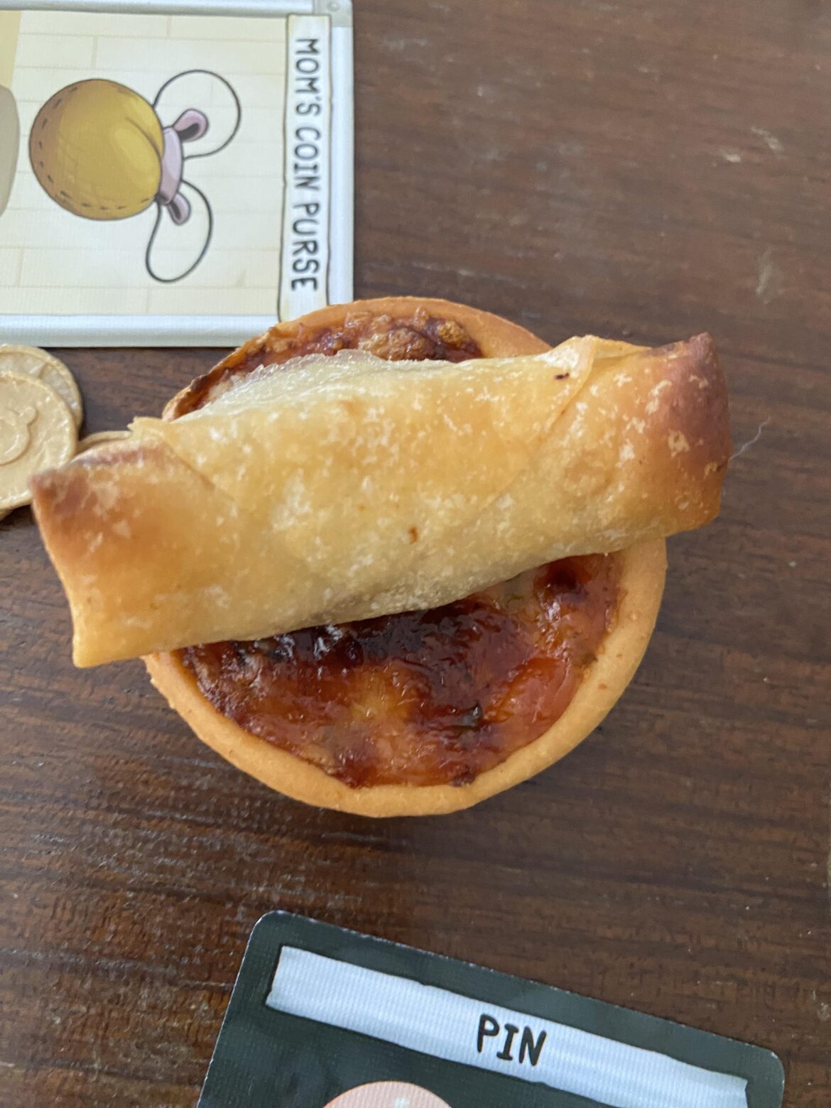 Vegetable spring roll on mini cheese pizza