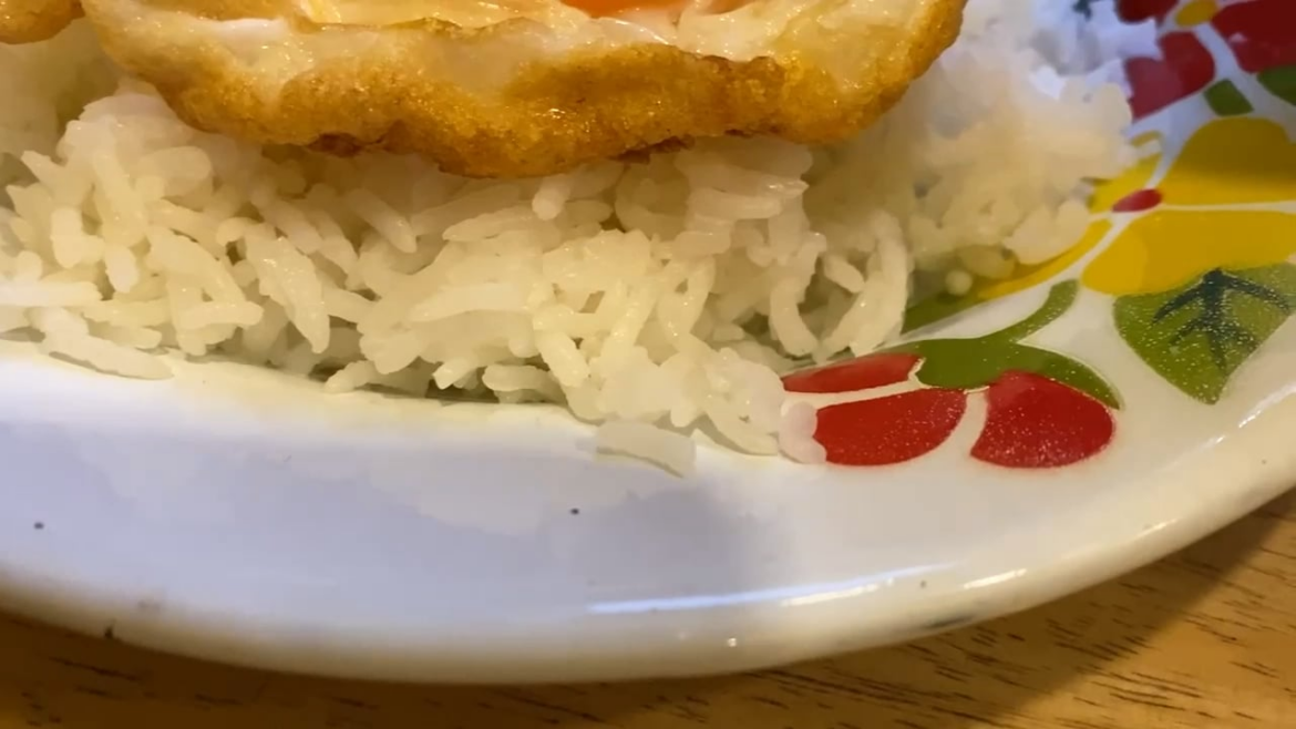 Pad krapow beef and a perfectly cooked duck egg at Mark Wiens (wholesome YouTuber) place Phed Mark in Bangkok