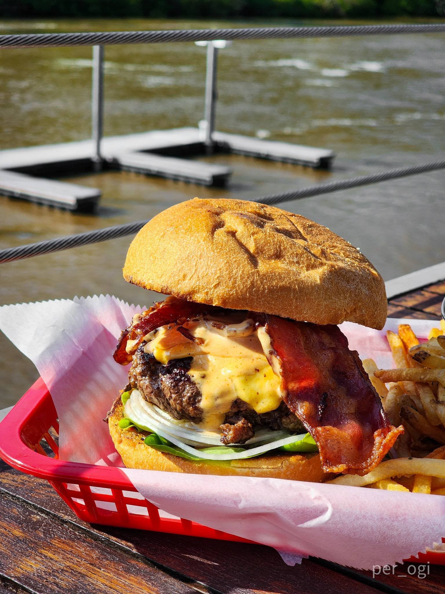 Burger w/ fancy sauce, bacon, pickles, onion, lettuce, and American