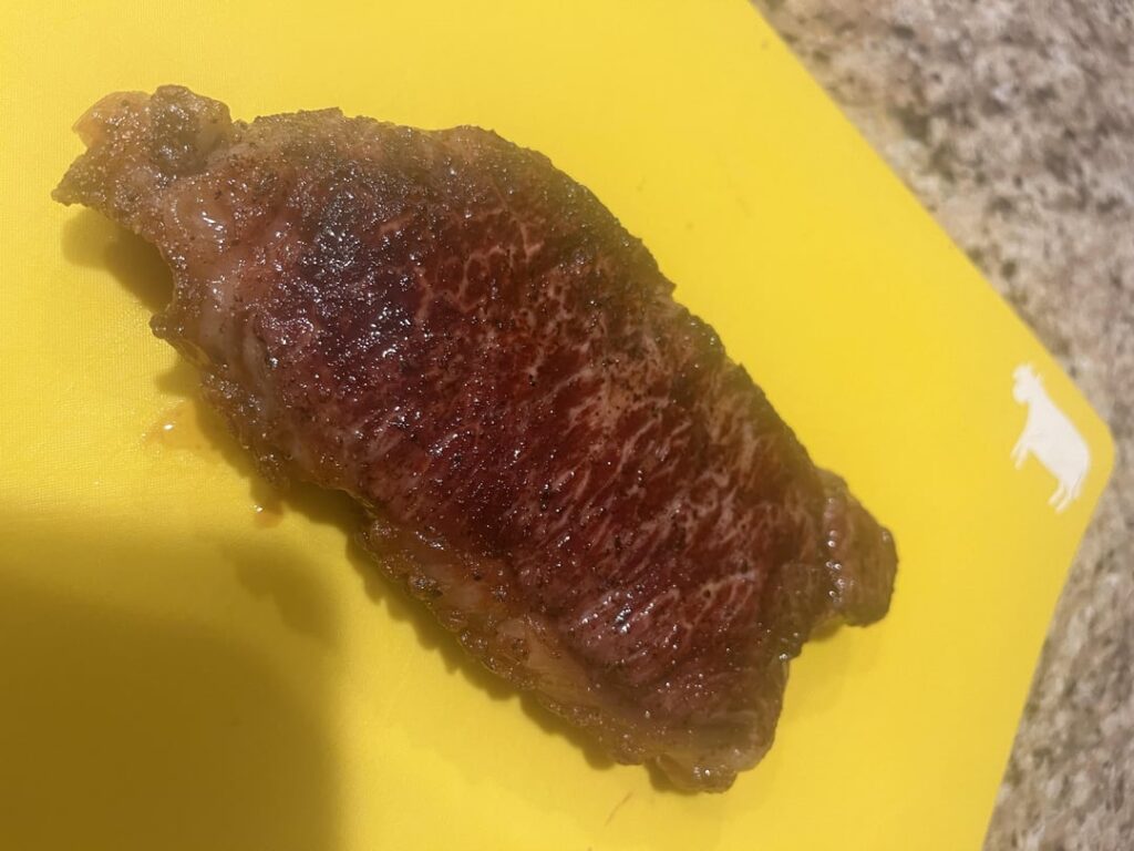 Kinda biffed the reverse sear on this one, but I scored the fat cap and topped it with Danske Blue cheese.
