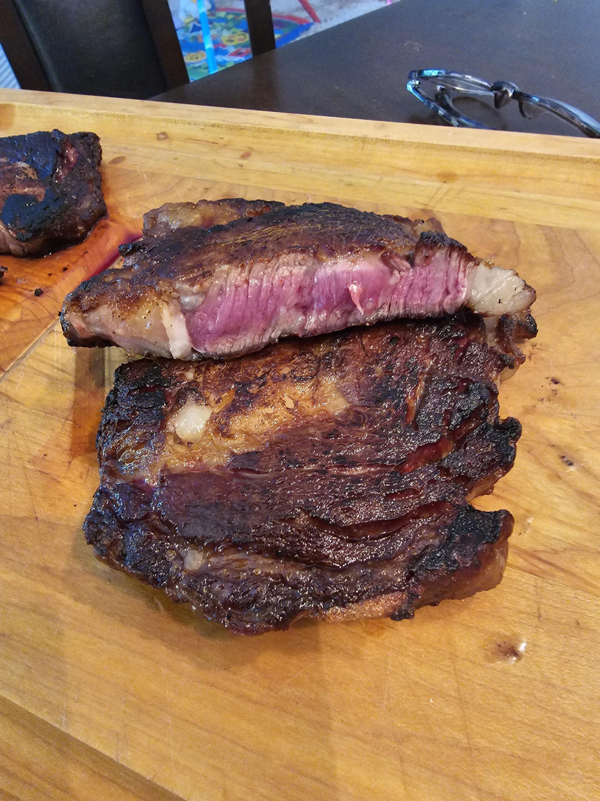 Cast Iron Ribeye. Shot for rare. Dining and Cooking