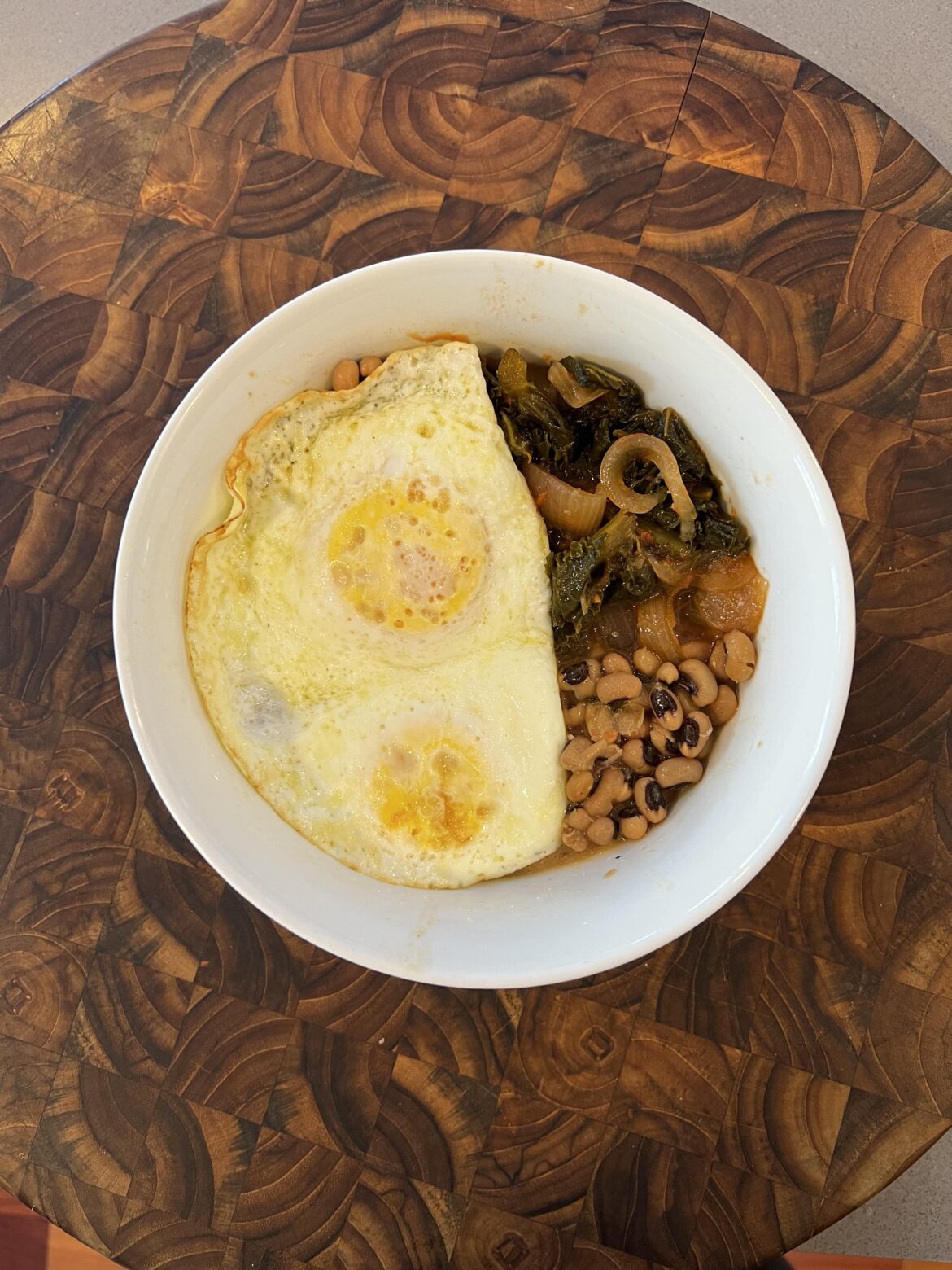 Hoppin John’s leftovers with an egg on it