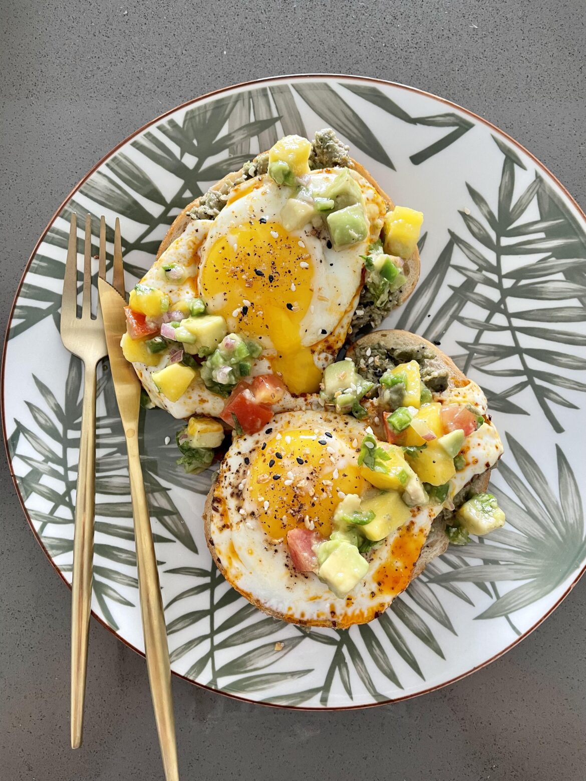 Good ol’ avo toast, topped with sunny side eggs fried in chili oil. Then topped with leftover mango-avocado salsa.