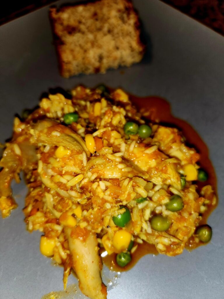 Galinhada Mineira (Brazilian Chicken and Rice) with Sun-Dried Tomato and Pecorino Romano Bread