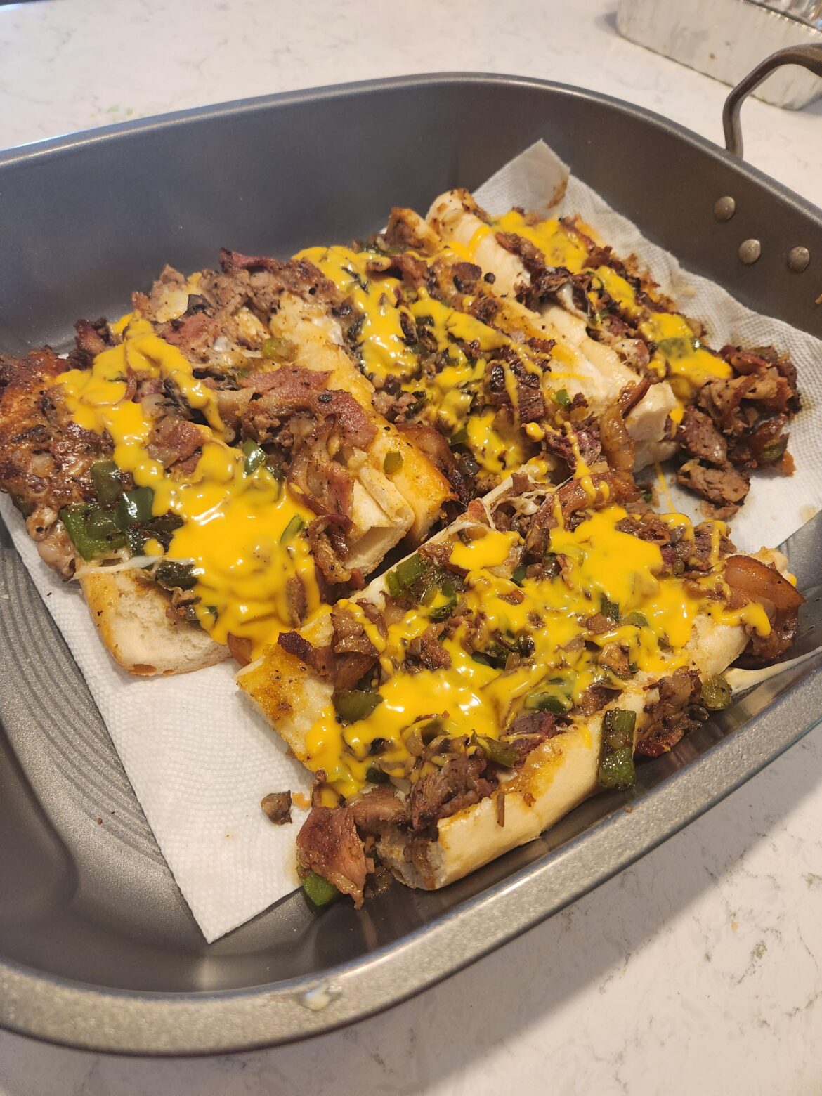 Smoked a prime rib, decided to turn it into Philly Cheesesteaks.